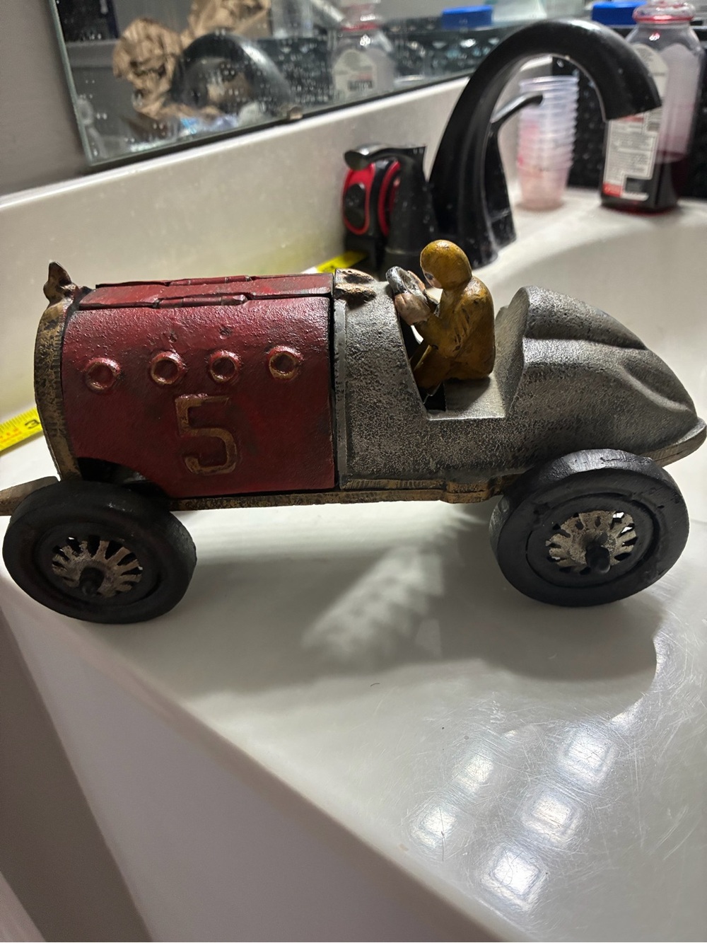 Vintage -style decorative cast iron race car modeled after Hubley racers